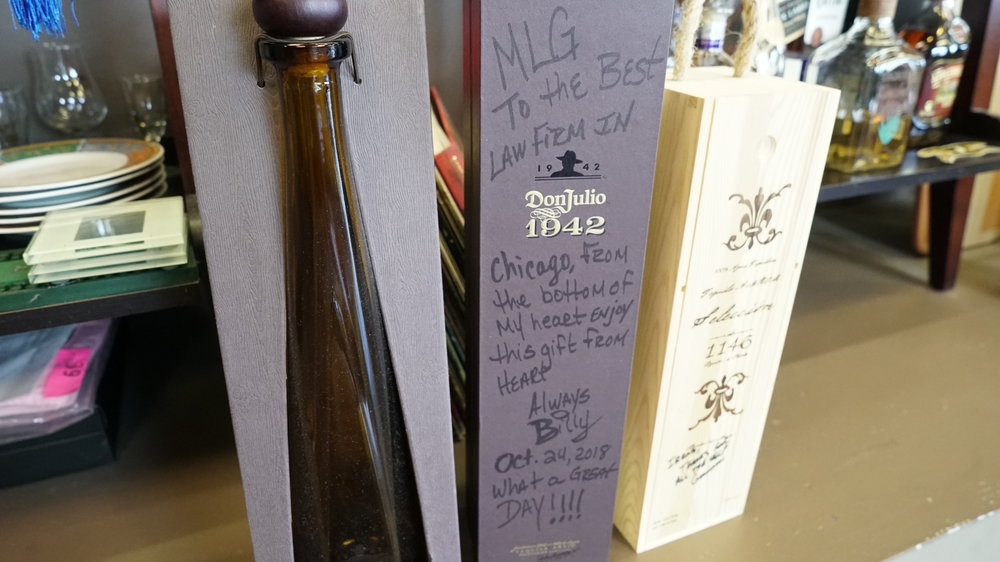 McDermott Law Group bottles signed by clients