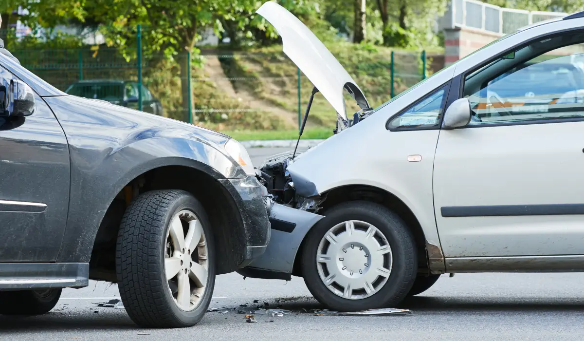 Two vehicles involved in a Chicago rideshare crash at a busy intersection, representing real-world accident scenes where liability and insurance coverage collide.